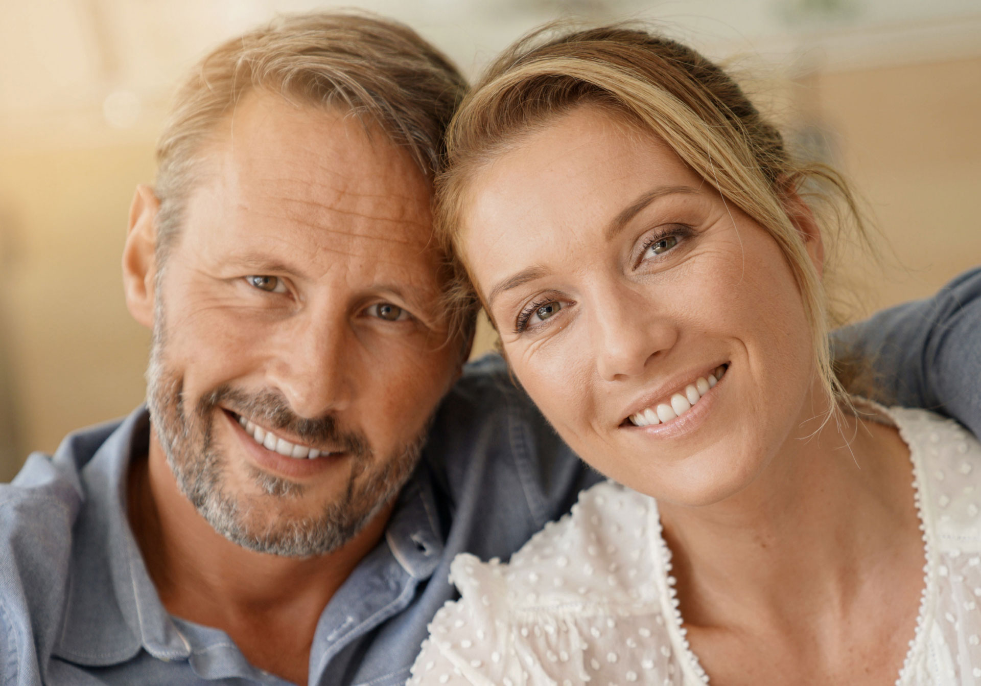 middle aged couple smiling